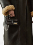 JACQUEMUS The Big Child Shoulder bag with flap.