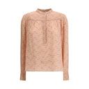 Blusa con estampado de follaje y cuello alto refinado